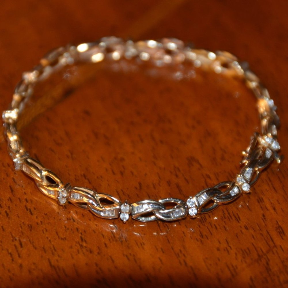 1 CT BAGUETTE & ROUND DIAMOND 10K GOLD HUGS KISSES "X" CROSSOVER TENNIS BRACELET